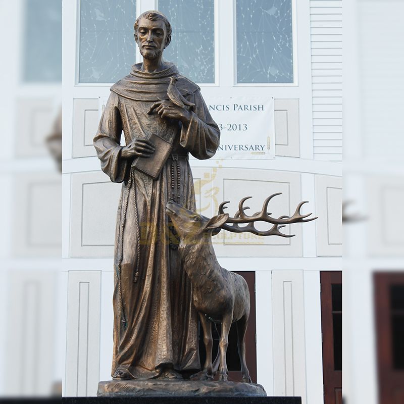 st francis statue with birds